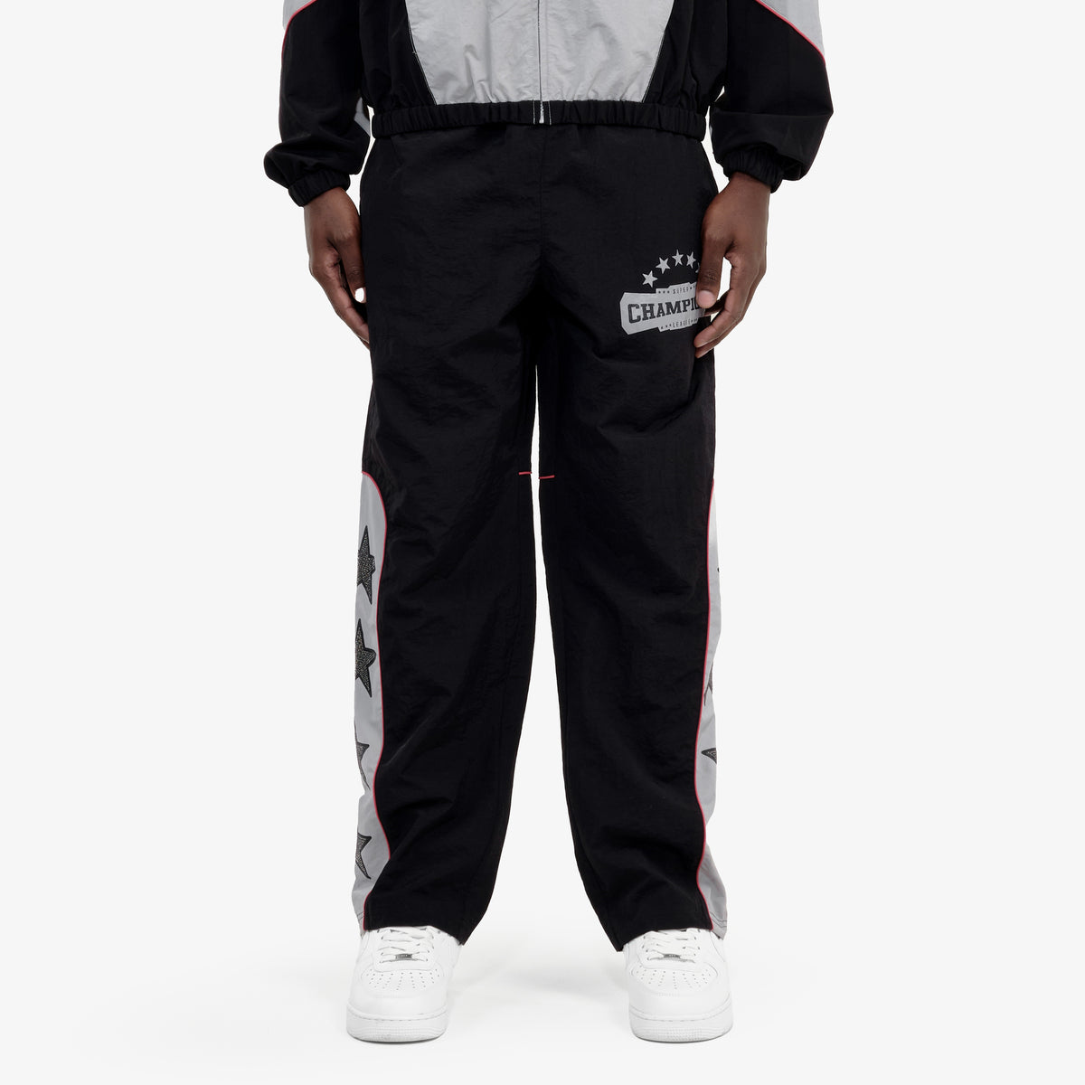 BLACK CHAMPS WINDBREAKER PANTS
