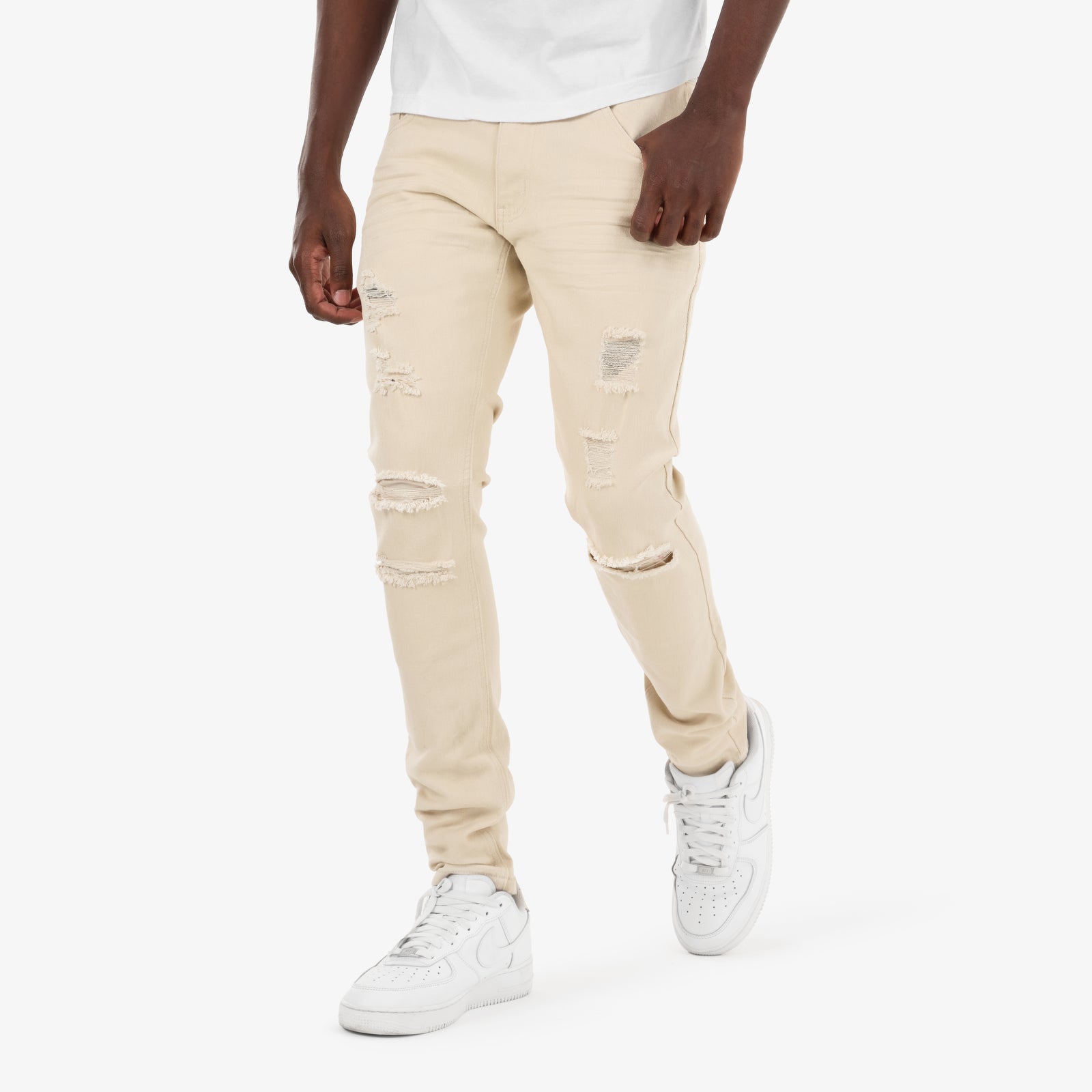 BEIGE PANTS WITH RIPS