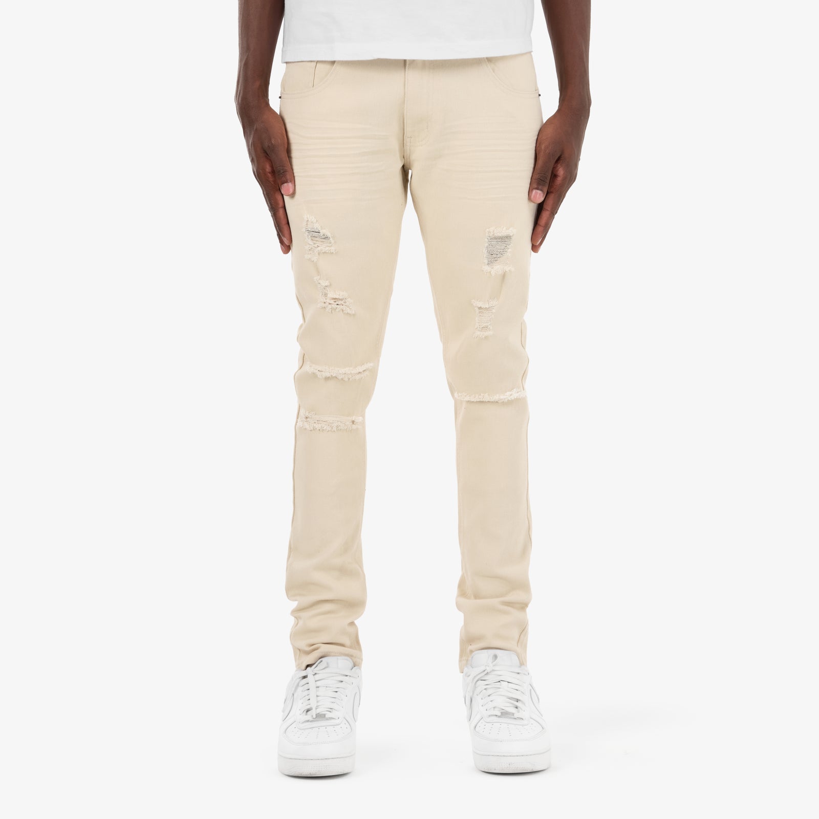 BEIGE PANTS WITH RIPS