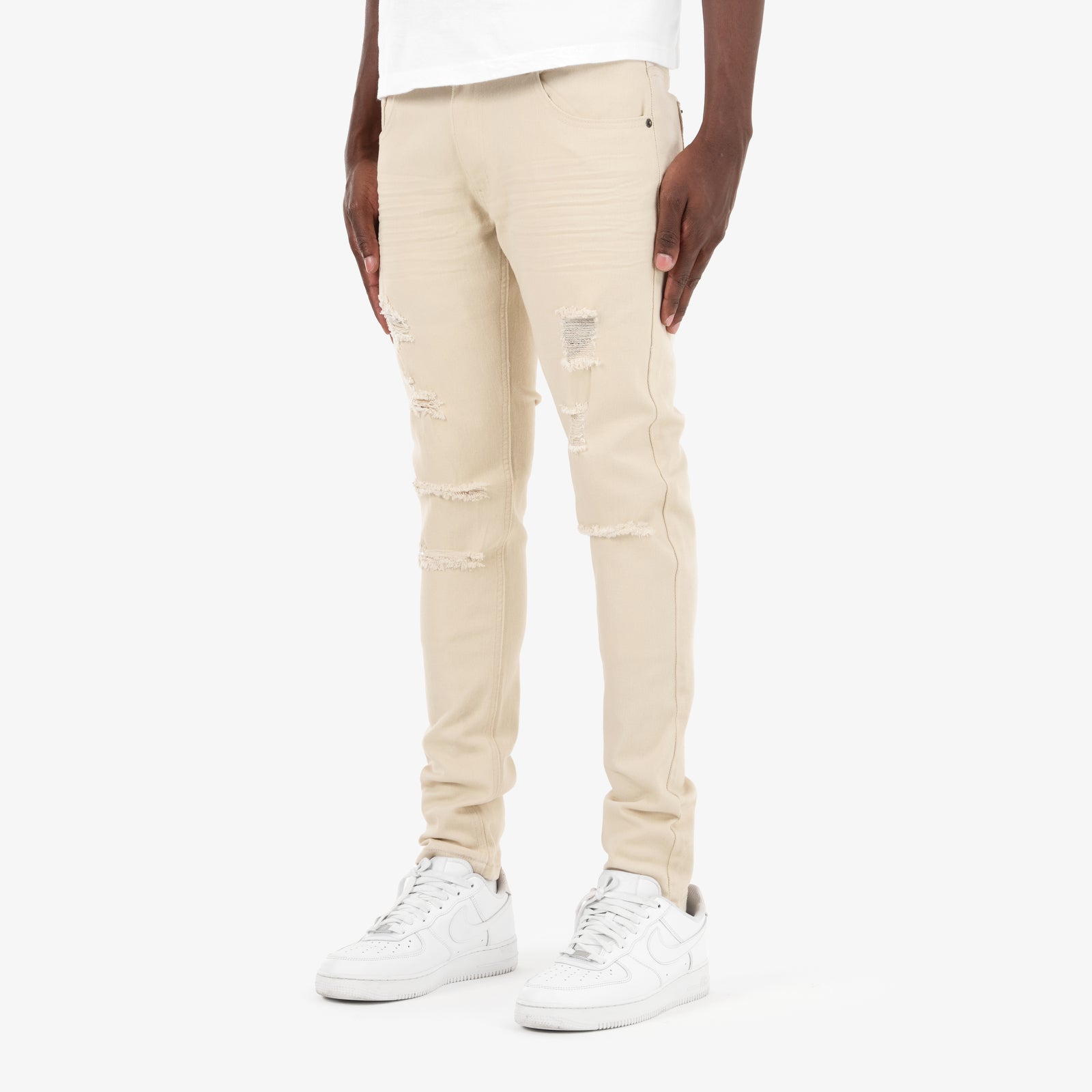 BEIGE PANTS WITH RIPS
