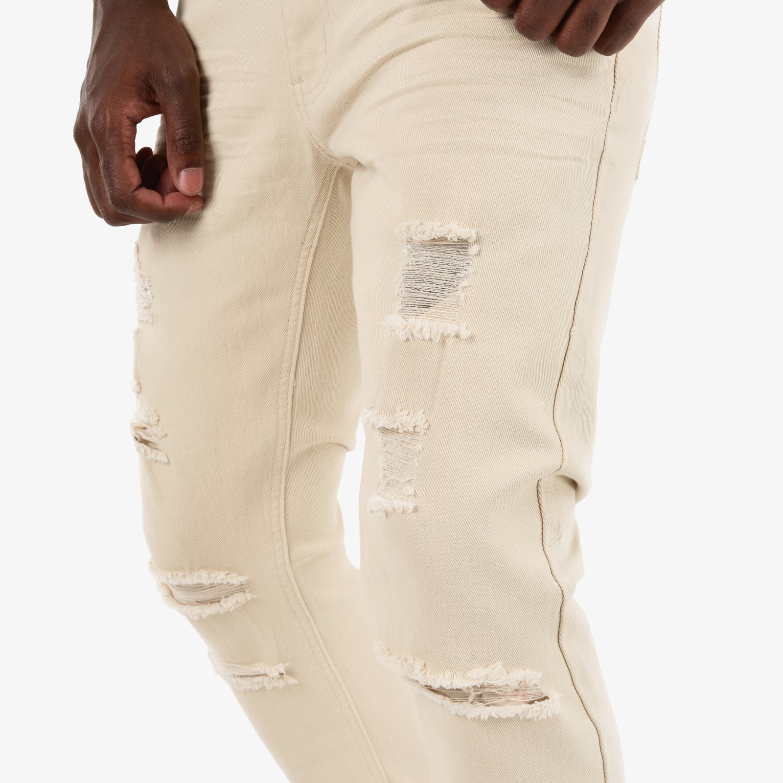 BEIGE PANTS WITH RIPS