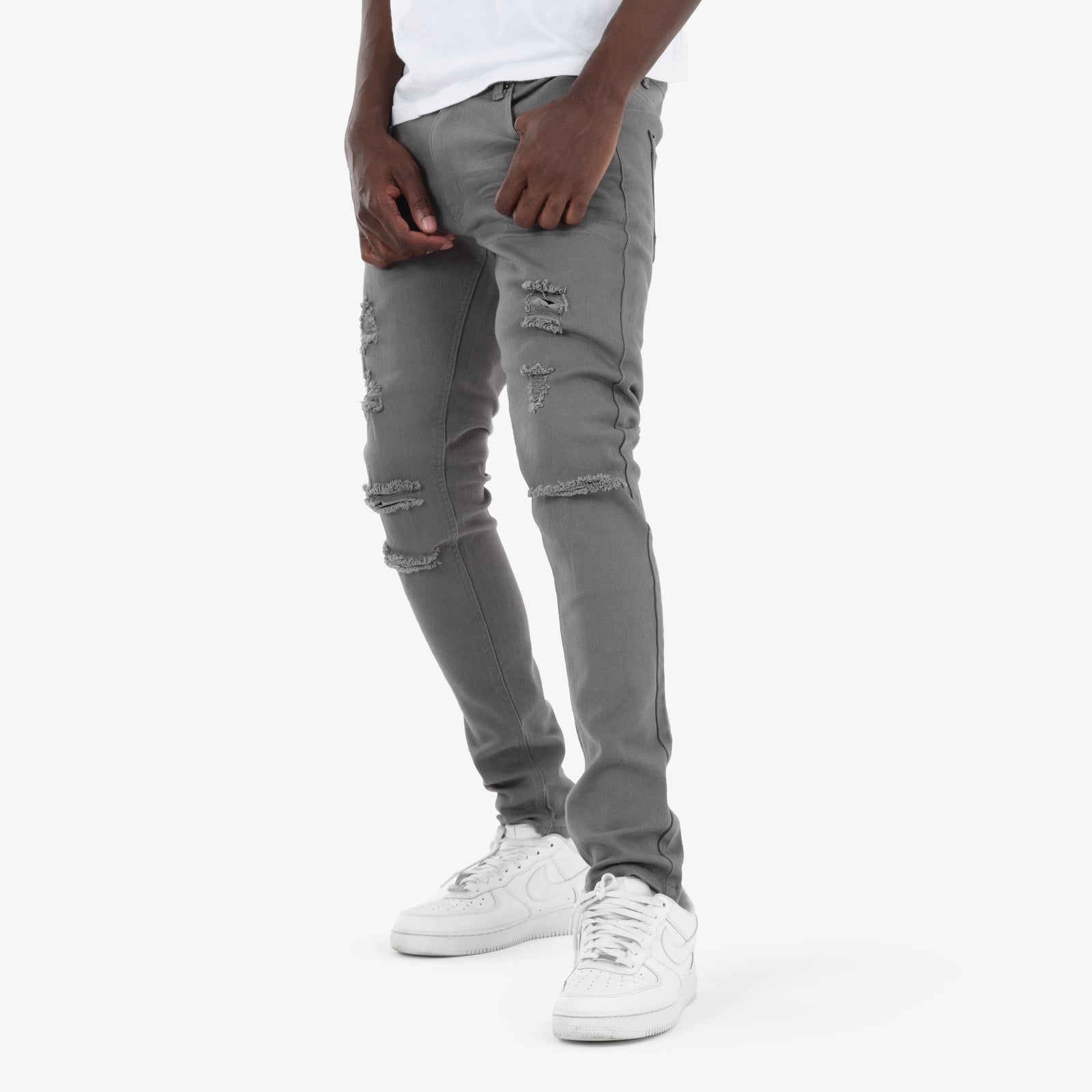 GREY PANTS WITH RIPS