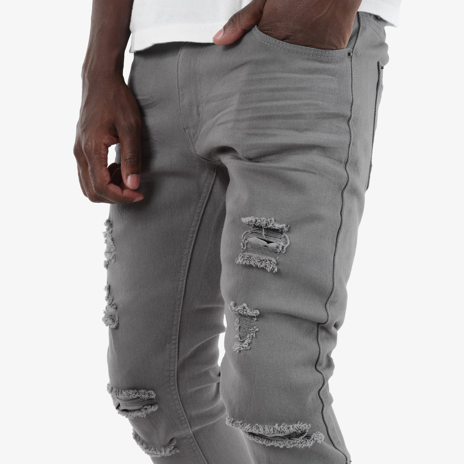 GREY PANTS WITH RIPS