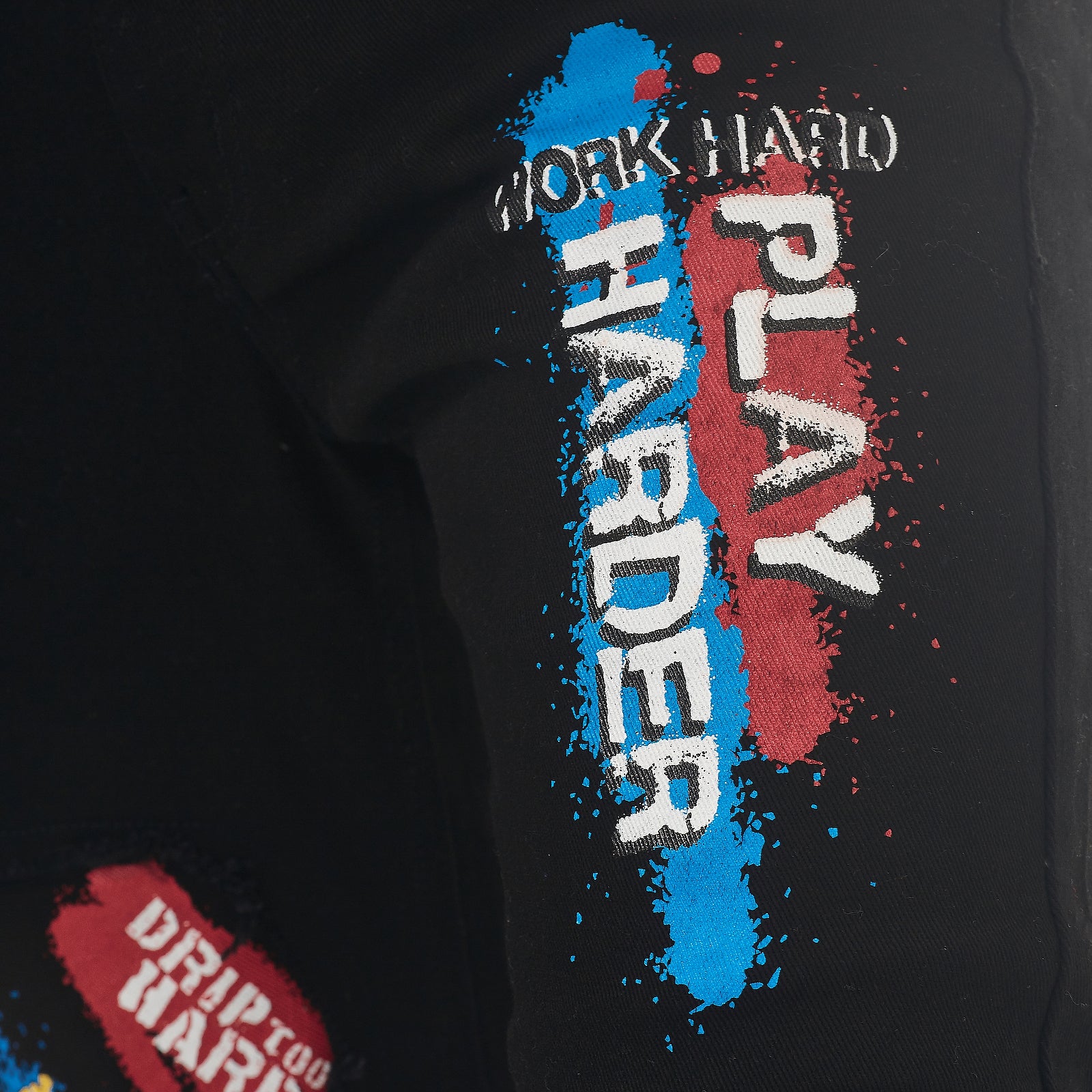 BLACK PANTS W/ GRAFFITI PRINTS
