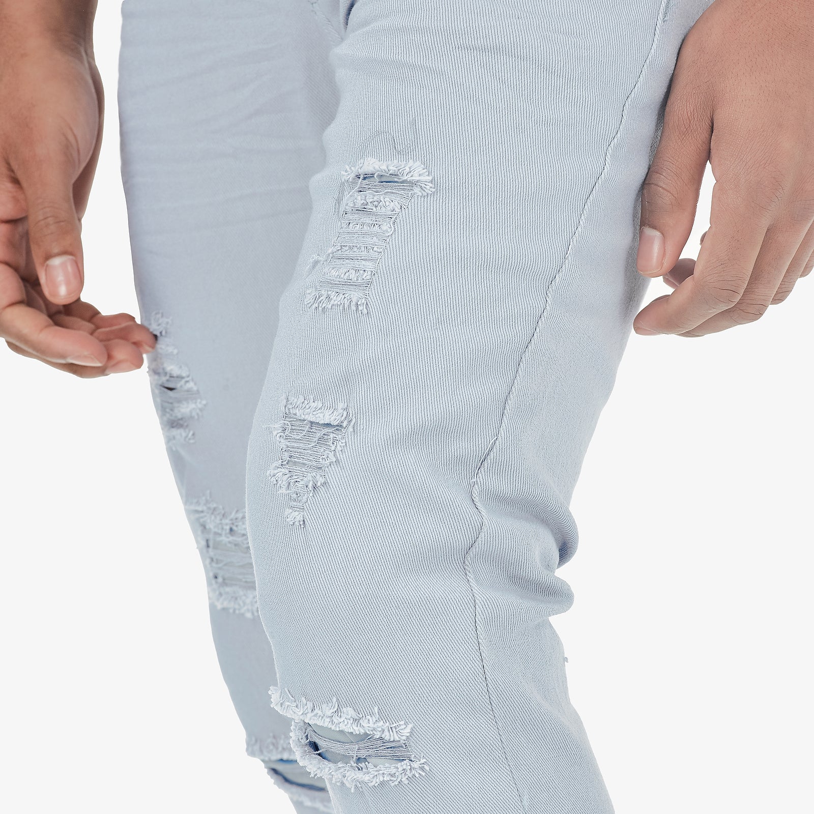 LIGHT BLUE PANTS WITH RIPS