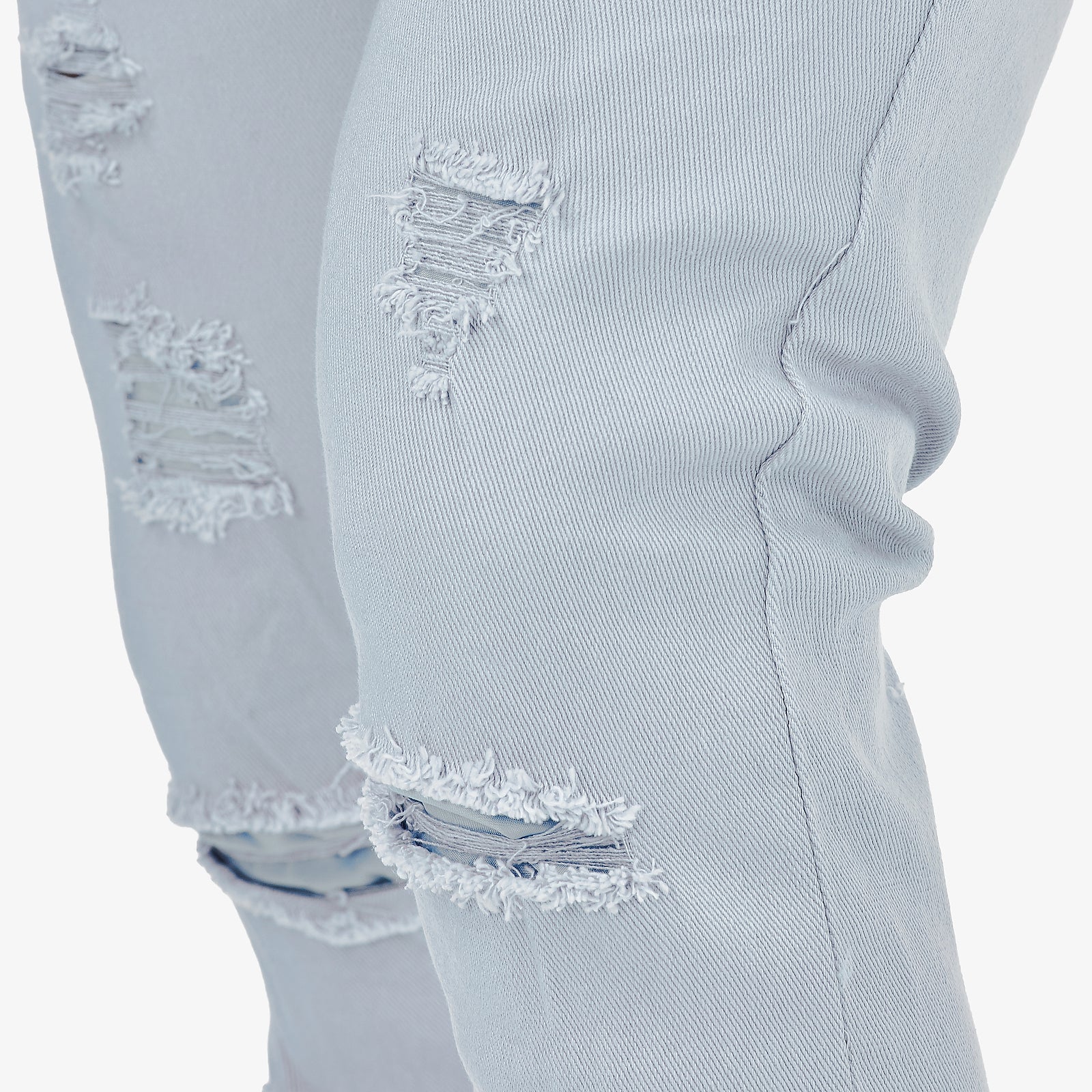 LIGHT BLUE PANTS WITH RIPS