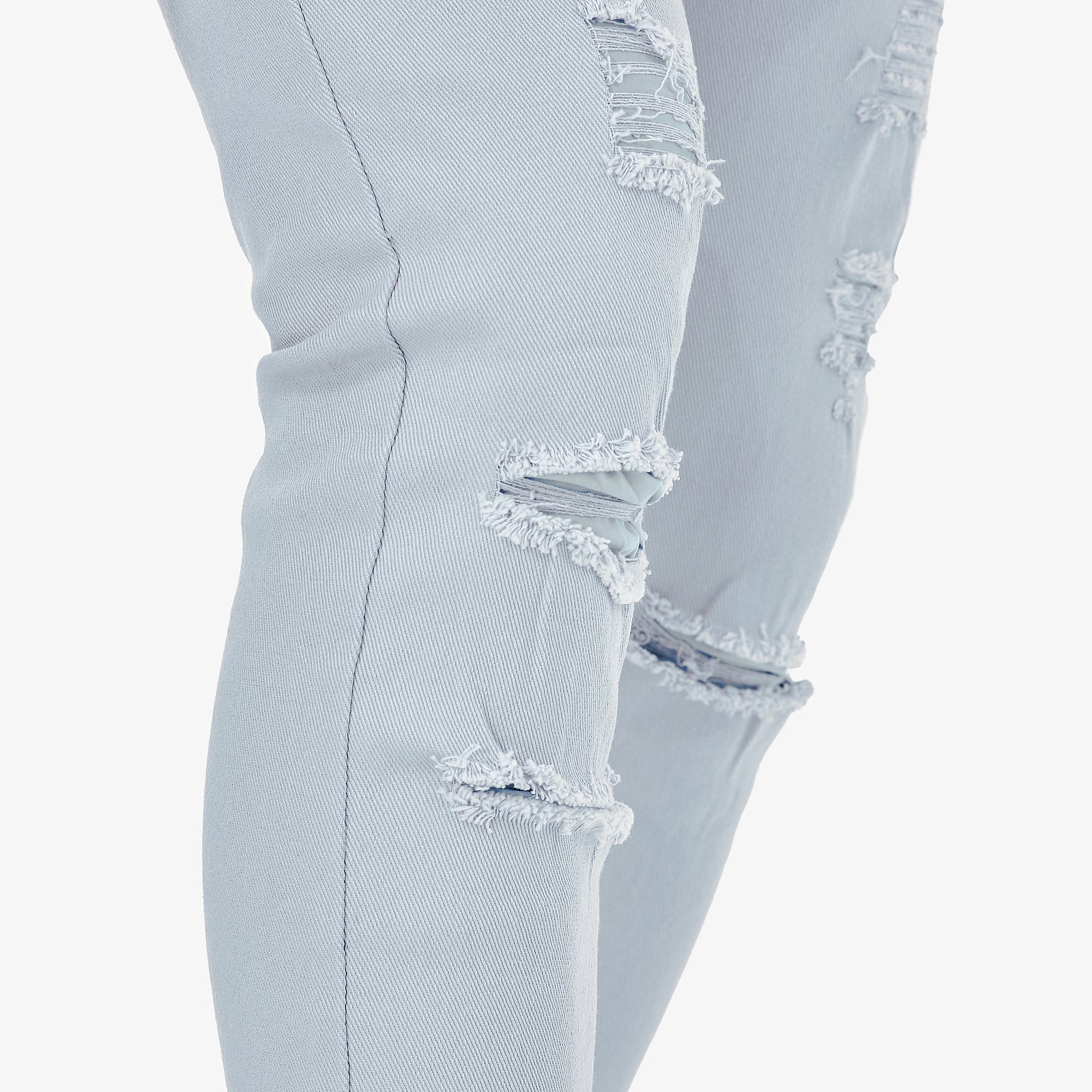 LIGHT BLUE PANTS WITH RIPS