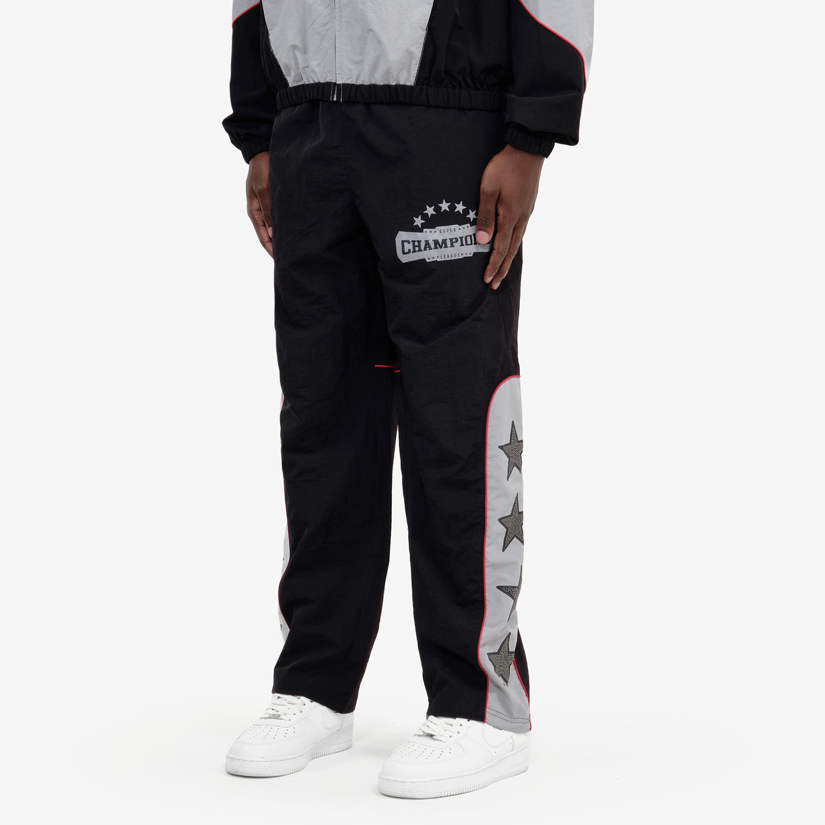 BLACK CHAMPS WINDBREAKER PANTS