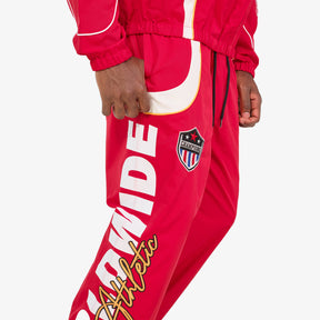 RED NYLON WORLDWIDE PANTS