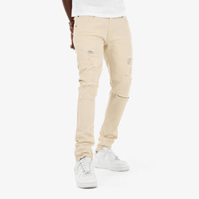 BEIGE PANTS WITH RIPS