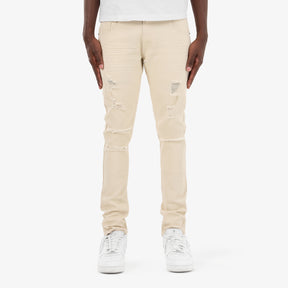 BEIGE PANTS WITH RIPS