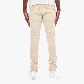 BEIGE PANTS WITH RIPS