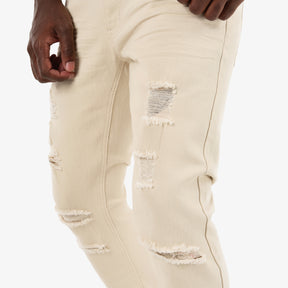 BEIGE PANTS WITH RIPS