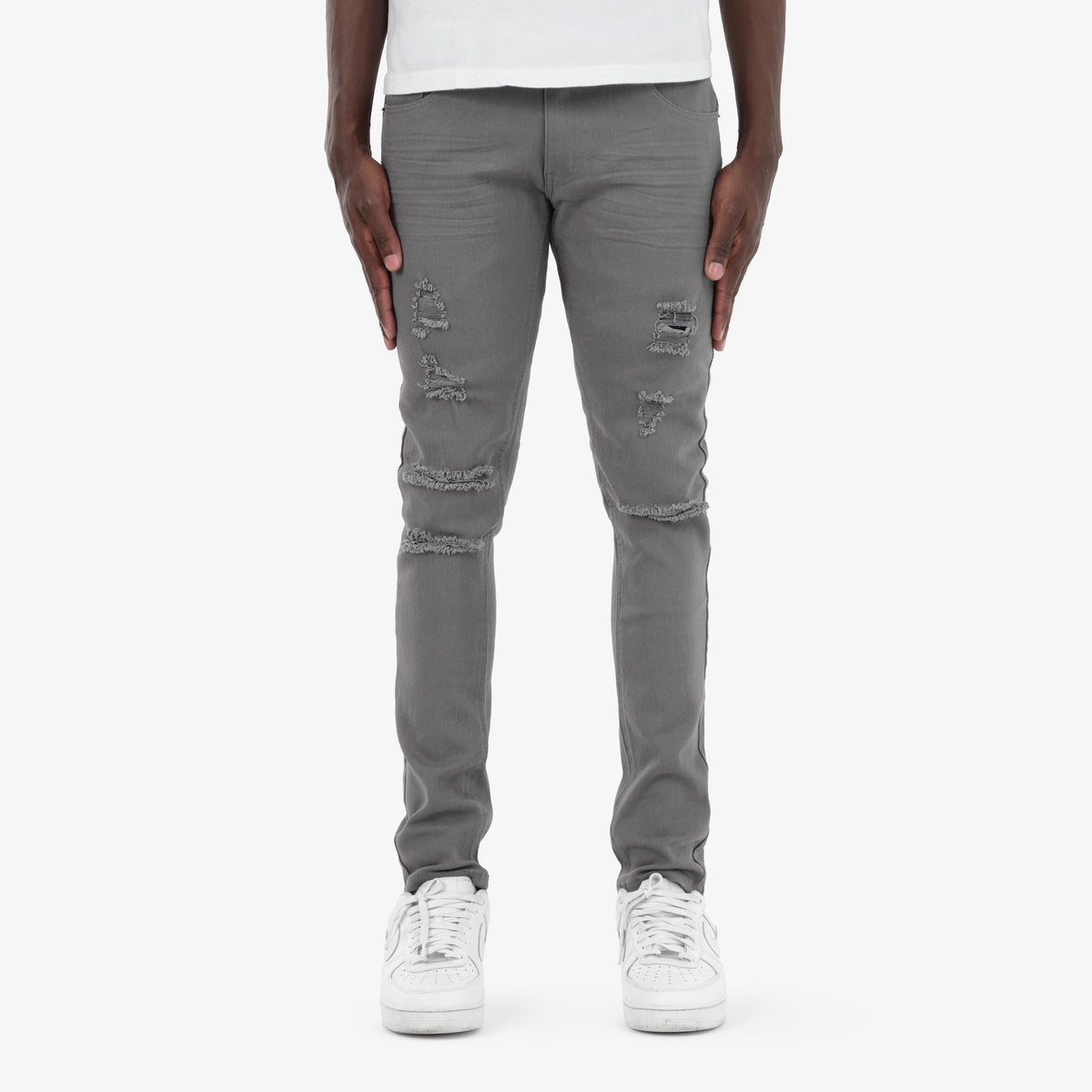 GREY PANTS WITH RIPS