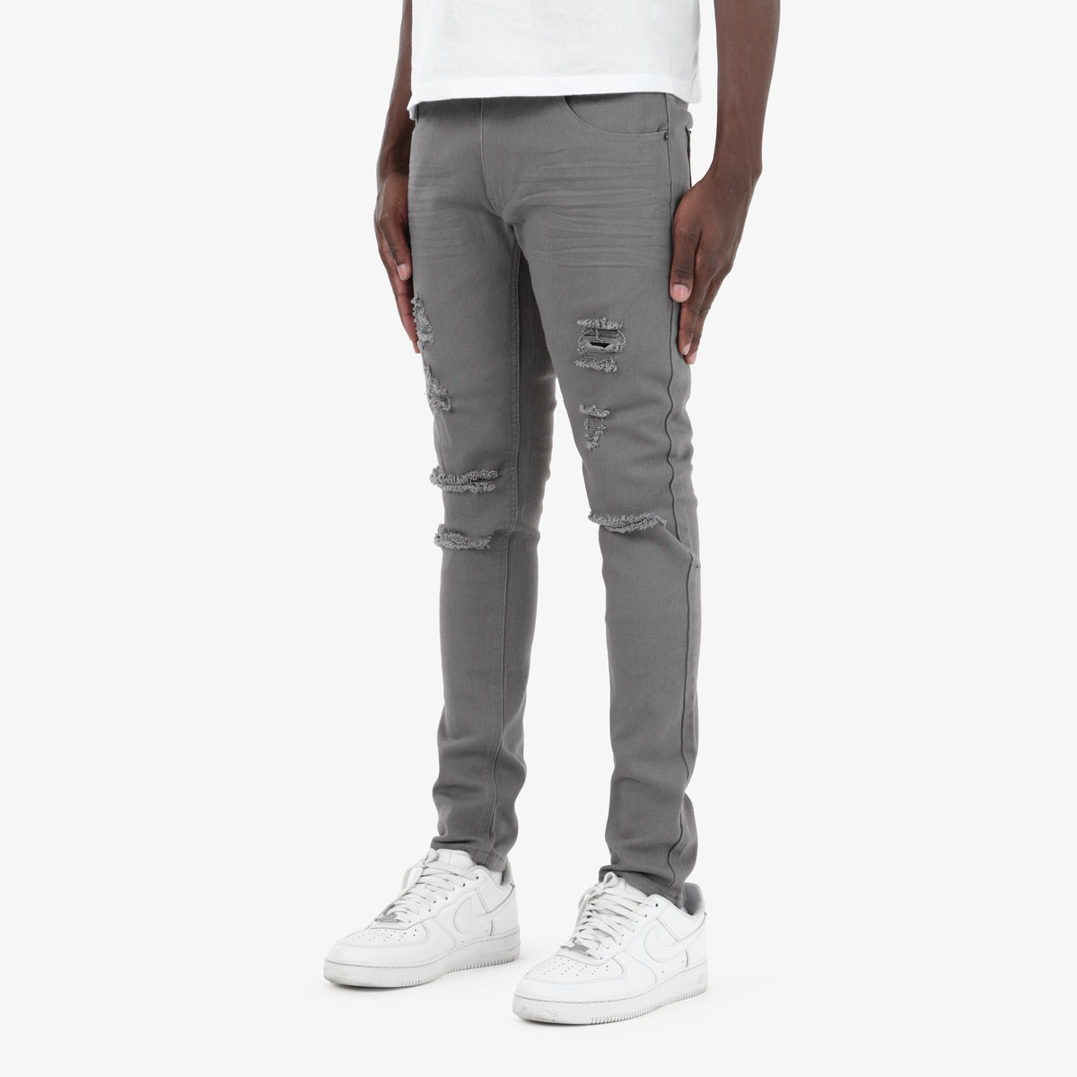 GREY PANTS WITH RIPS