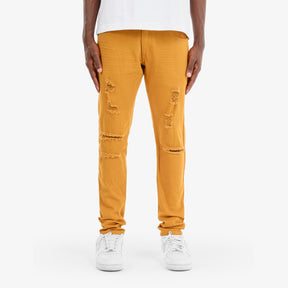 TIMBER BROWN PANTS WITH RIPS