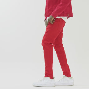 RED PANTS WITH RIPS