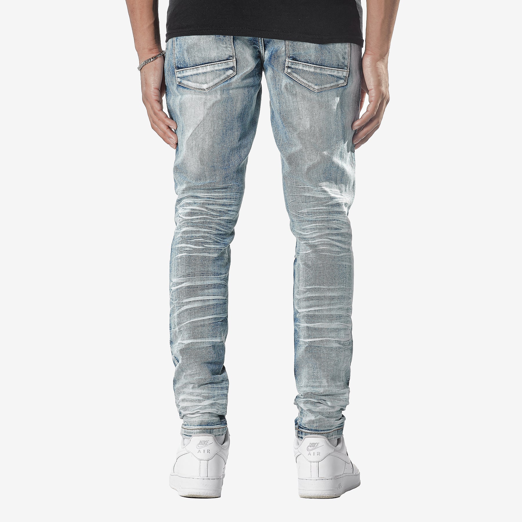 LIGHT TINT BLUE JEANS WITH RIP & REPAIR